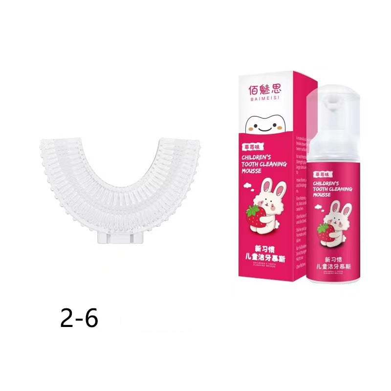 A children's tooth cleaning set on a white background, featuring a white U-shaped toothbrush attachment and a pink bottle of tooth cleaning mozzarella next to its matching pink box.
