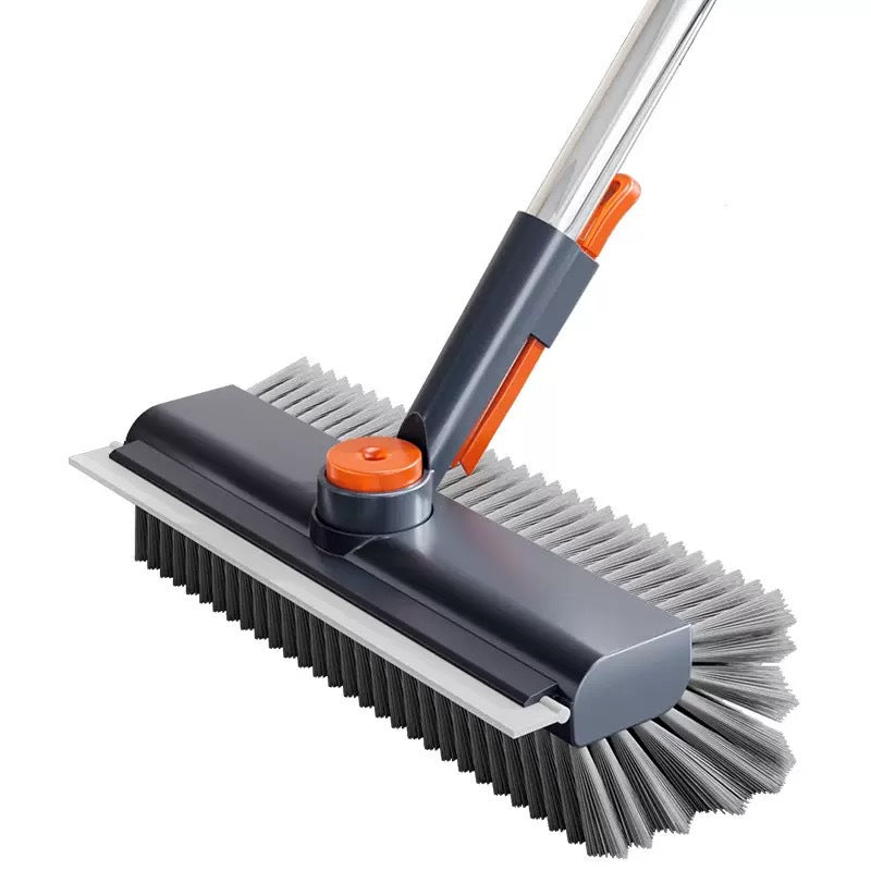 Cleaning brush with gray bristles and orange handle on a white background